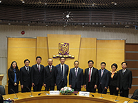 Prof. Joseph Sung (fifth from left) poses for a group photo with Mr. Mao Chaofeng, Executive Vice Governor of Hainan Province (fifth from right) and other delegates